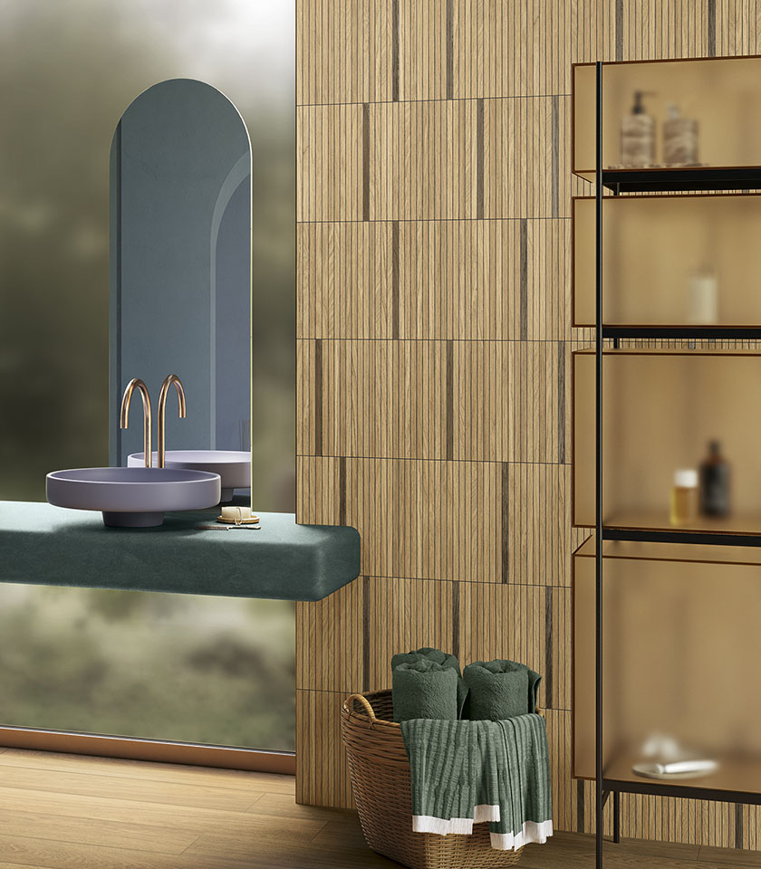 Découvrez comment créer une salle de bains effet bois élégante et accueillante grâce à des surfaces, textures et solutions design qui allient esthétique, confort et fonctionnalité.